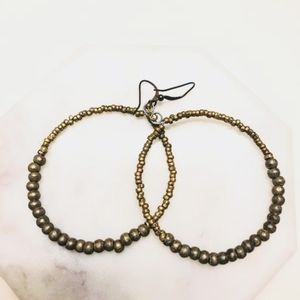 Adorable silverish beaded metal hoop earrings